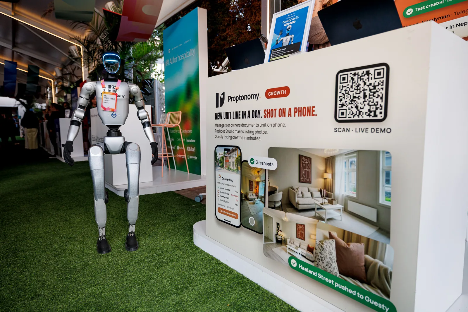 Proptonobot walking past the Proptonomy counter with the Reshoot Studio demo