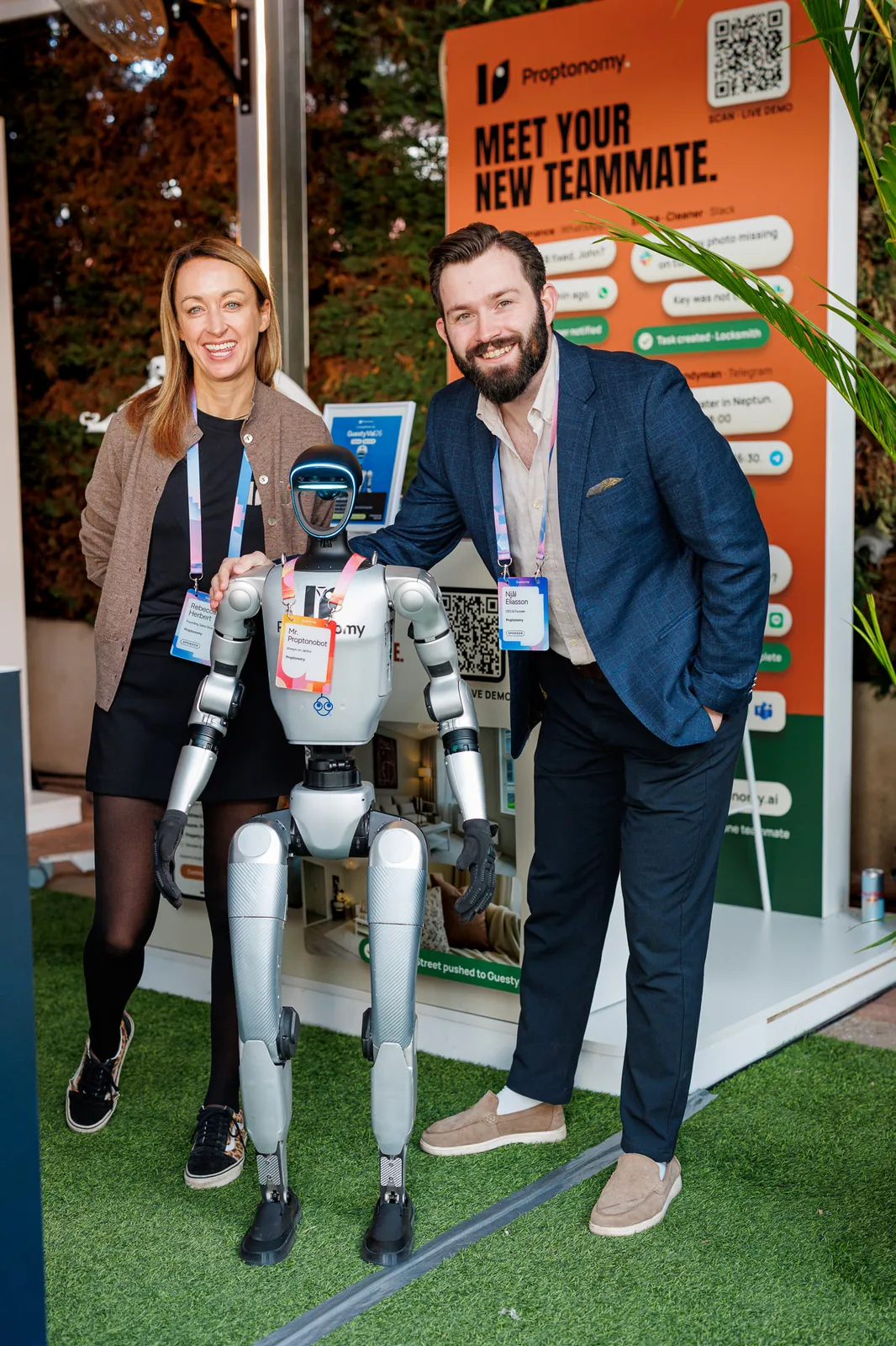Rebecca Herbert and Njål Eliasson with Proptonobot in front of the Proptonomy stand