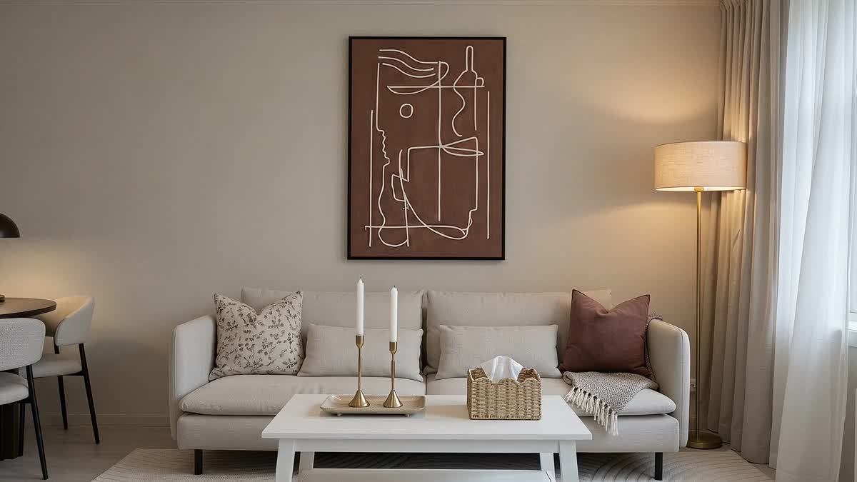 Reshoot Studio detail shot of the sofa and wall art