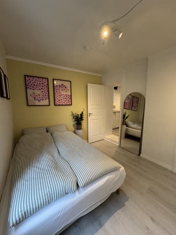 Owner's phone snapshot of the bedroom